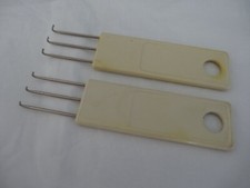 2 GRIFFES POUR POIDS Machines