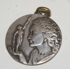 médaille ancienne en métal