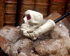 pipe en terre cuite sculptée