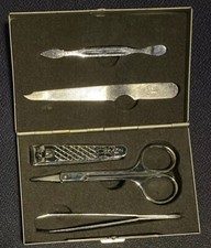Preowned Pedicure 5 Piece Manicure Set In 4.25” x 2.75” Silvertone Case.