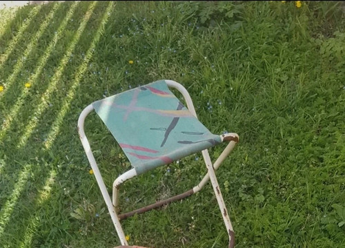 Tabouret pliant vintage vert