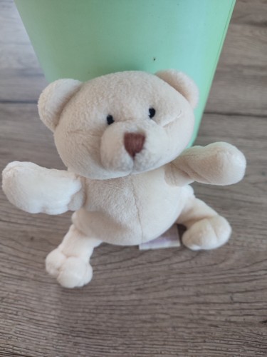 Peluche doudou ours couché