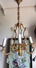 Lustre en bronze à quatre