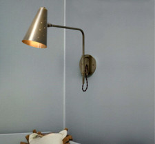 Applique en laiton articulée