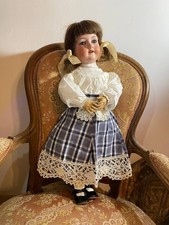 Poupée tête porcelaine