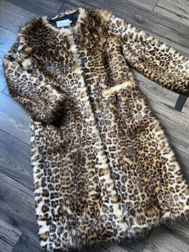 Manteau fourrure - en,