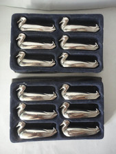 Lot de 12 porte couteaux métal argenté en forme de canard