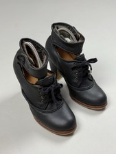 Bottes à talons en cuir