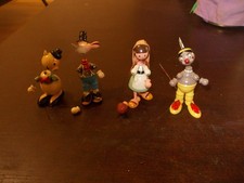 Lot 4 figurines bois avec