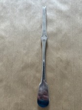 1 curette à homard /