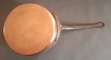 A hammered and tinned copper pan, cast iron handles. Ø19.5cm height 8.5c