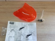 UN COUVRE GUIDON BULLE SAUT DE