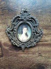 1 médaillon ancien en laiton