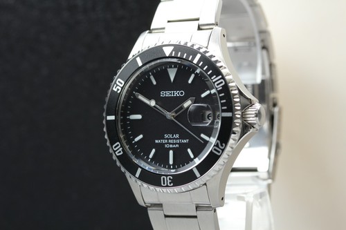 Presque comme neuve montre - *presque, neuve*