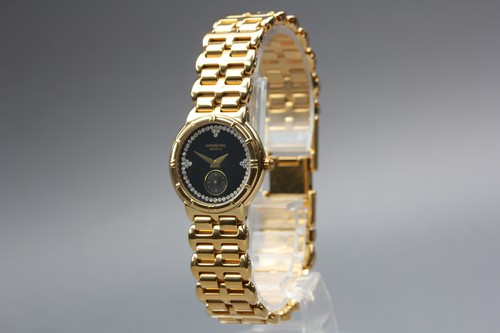 Presque comme neuve - [], montre