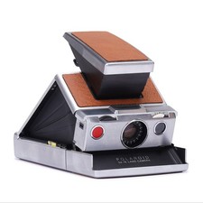 Vintage polaroid sx-70 instant camera - refurbished classic slr with manual