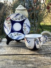 Tasse, sous tasse polychrome -