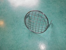 Grille de phare 124 mm moto ancienne neuve ancien stock