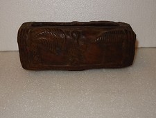 UN EBAYEUR M'INFORME QUE CE SERAIT UN PORTE-JOURNAUX MOBILIER AFRICANISE 1950-60