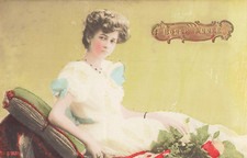 CP GOOD YEAR WOMAN ELEGANT ON COUCH - 46558