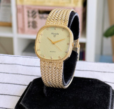 Montre Nivada quartz homme - dress watch - Bracelet intégré doré - Pile neuve