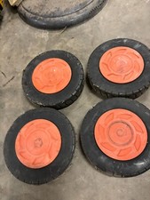 Pre-owned wheel and tire that work well on a Kubota W5019 push mower.