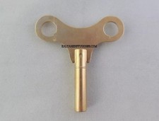 Clef clé papillon horloge