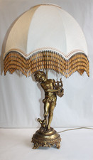 Grande lampe en régule doré