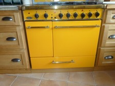 Cuisinière a gaz/elect Godin Chatelaine  quasi neuf - piano de cuisson