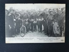 Old postcard French officers bringing helmets from German officers