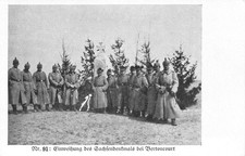 War 10 914. German soldiers on a tomb.  24022