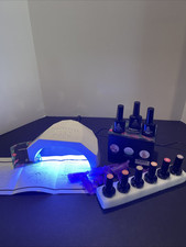 Beetles Gel Polish UV LED Nail Lamp Pro with various nail care products Good Con