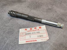 Axe de mécanisme de kick pour