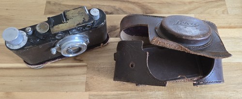 Leica noir - d),