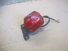 Feu arrière + support plaque