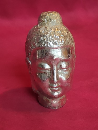 Tête de bouddha en métal