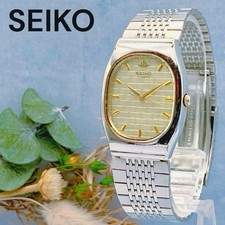 Montre Seiko Galaxy Quartz Vintage Ovale Cadran Or Bracelet Argenté Femme
