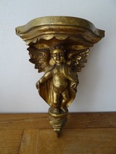 Pretty large console with angelot decoration in resin or gold molded wood