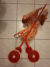 Ancienne poussette pliante en