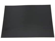 Plaque auto-adhésive pour