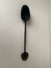old black plastic CONA measuring spoon