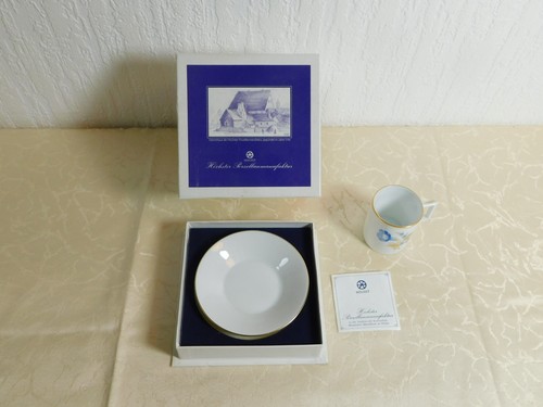 Collectible cup and saucer - and,