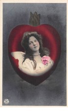 Angel - No. 76677 - Young woman wearing angel wings in the middle of a heart