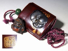 Masques signés Inro Tengu &