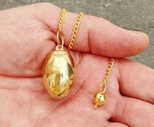 °* PENDULE  OEUF COSMIQUE