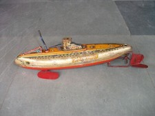 Jouet En Fer Blanc Mécanique