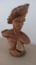 Buste , statuette en terre