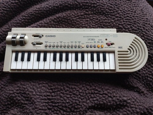 Casio mini 32 touches - casio,