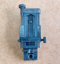Unusual adjustable sight for
