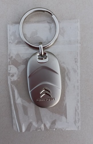 Neuf authentique porte clé - authentique,